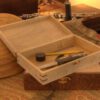A Hand-Crafted Tool Boxes with tools in it.