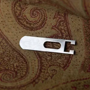 A metal object on a fabric.