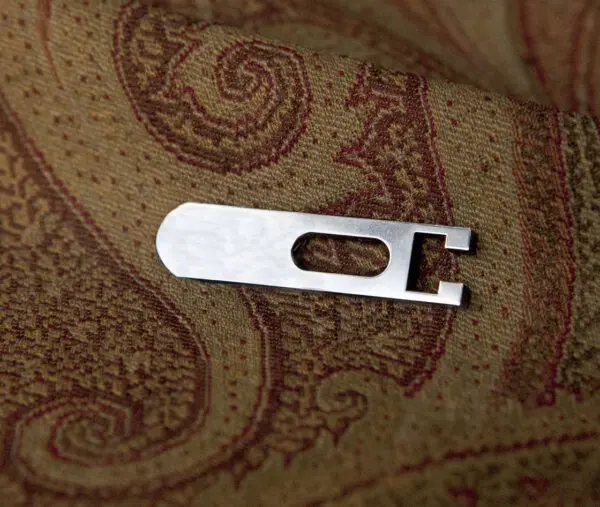 A metal object on a fabric.