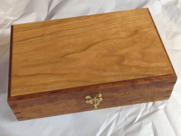 A small Hand-Crafted Tool Box with a brass latch.